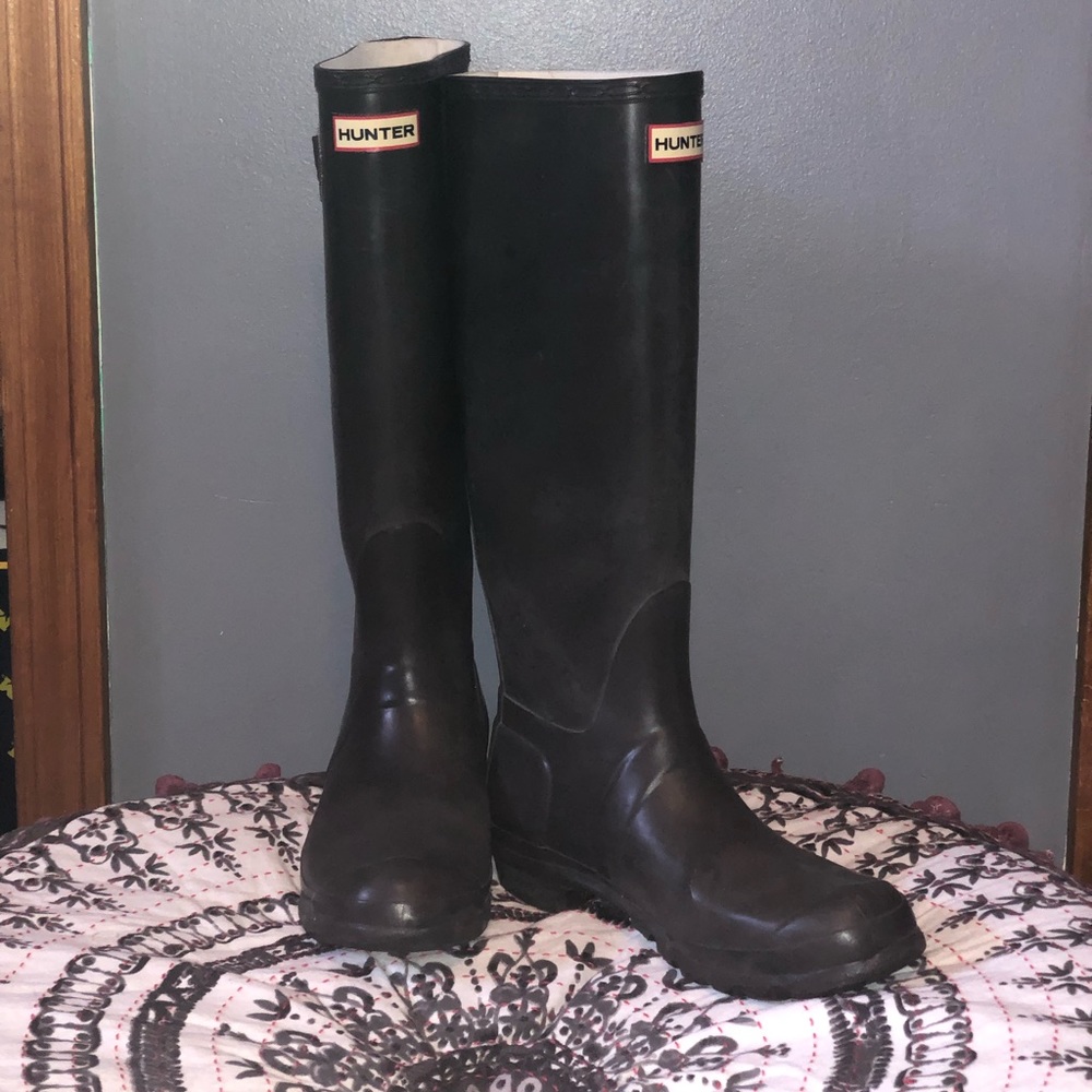 Dark brown matte Hunter boots.